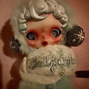 Skullpanda “Song of Snow” plush doll charm from Popmart Winter Symphony